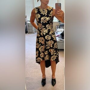 Worn once to a wedding. This is a beautiful dress!